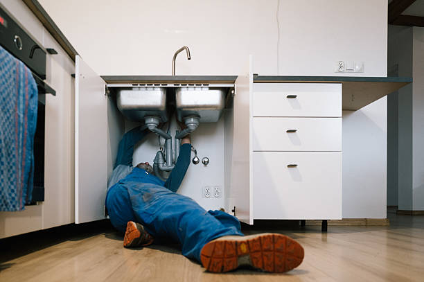Professional Emergency Plumber technician working in Hassell, NC